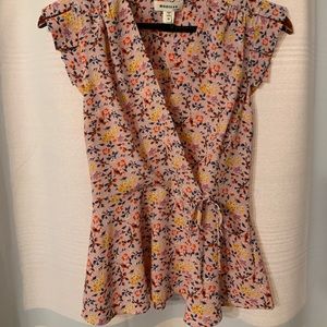 Sleeveless peplum top